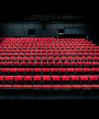 Røde sæder og stole i teatersalen i ODEON